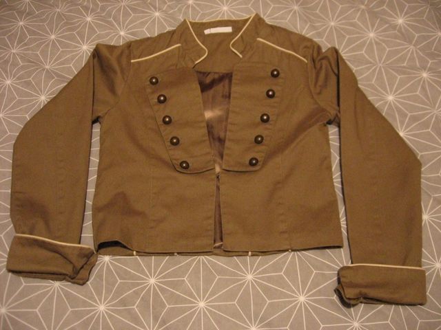 Cazadora como nueva de niña, talla_14 verde.