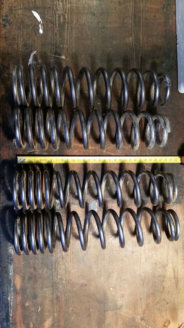 4 MUELLES DE AMORTIGUADOR.