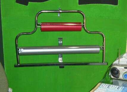 Porta papel de regalo de pared