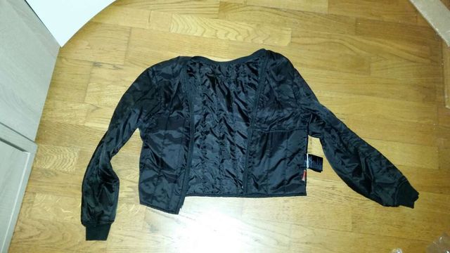 Chaqueta chica moto Dainese.