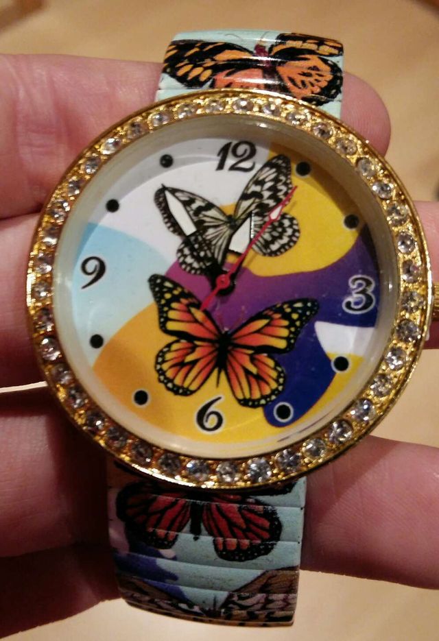 Reloj mariposas