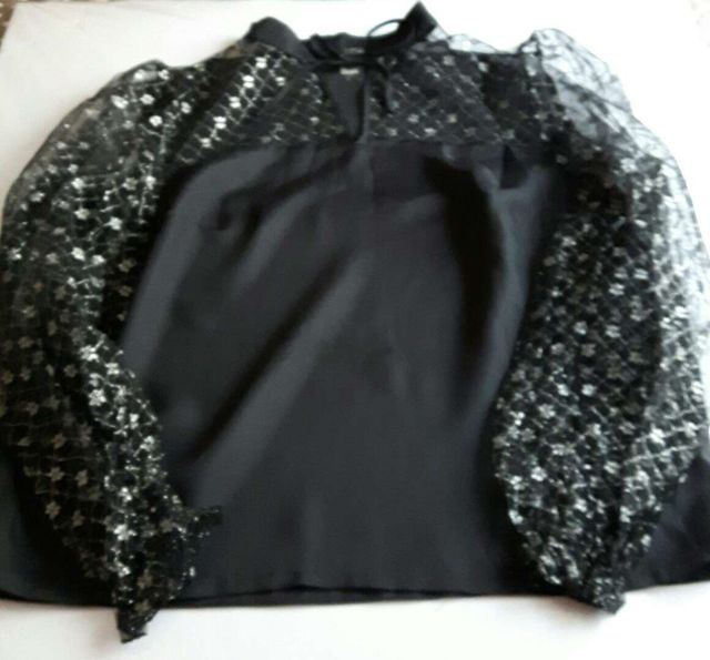 Bonita blusa fiesta semitransparente