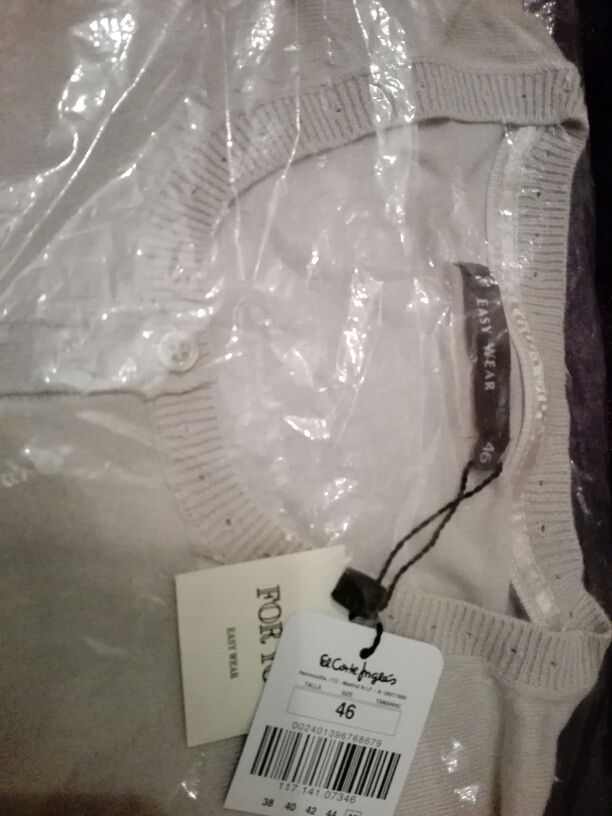 chaqueta corta de punto.del Corte Inglés..beige..