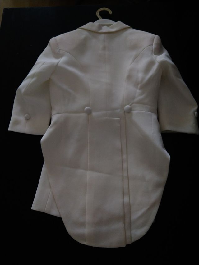 Frac de niño blanco