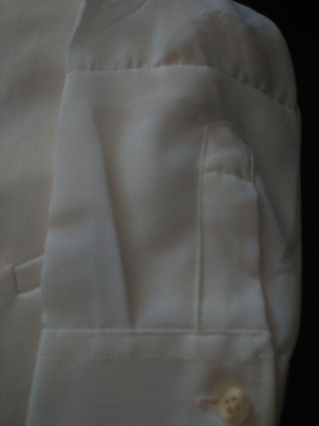 Frac de niño blanco