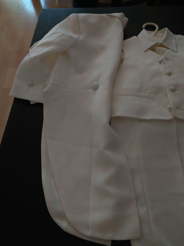 Frac de niño blanco