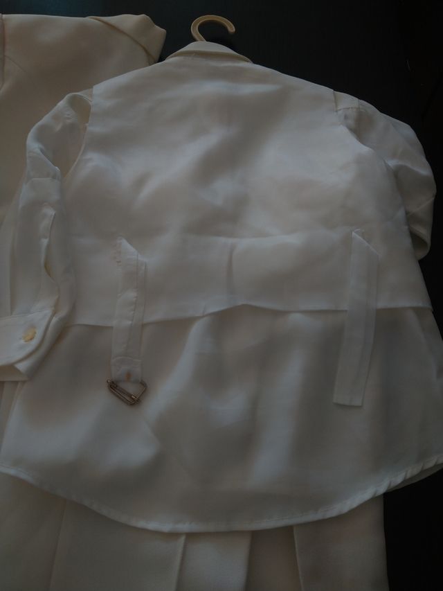 Frac de niño blanco