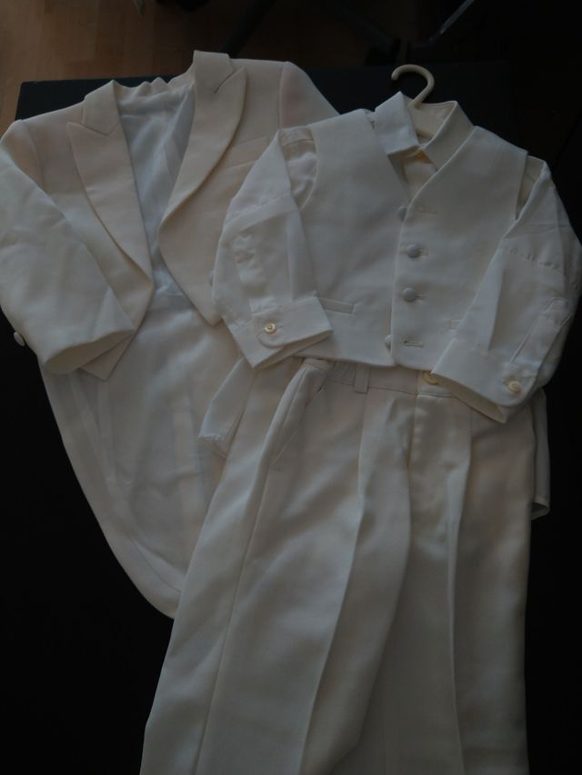 Frac de niño blanco