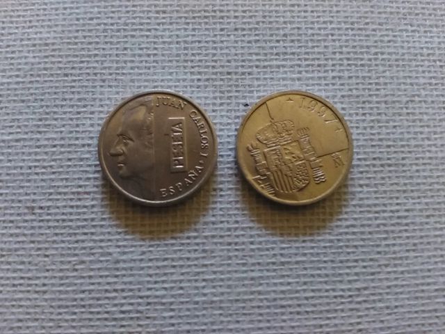 Monedas una peseta y arras