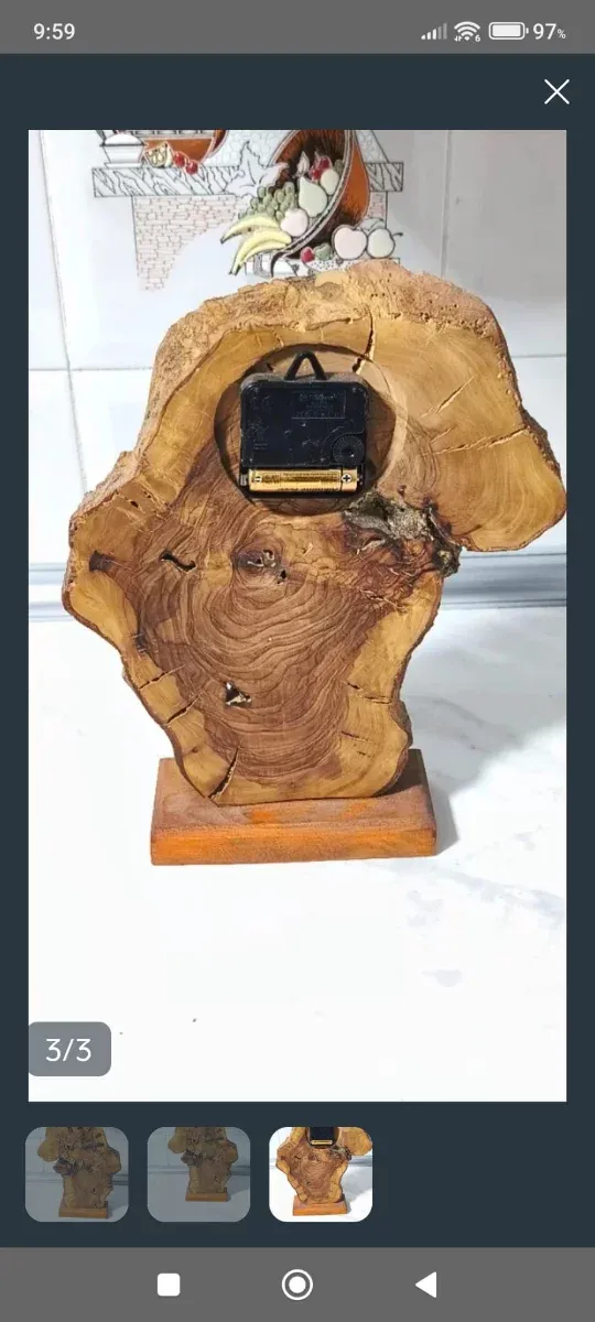 Reloj en madera de olivo pieza unica hecha a mano