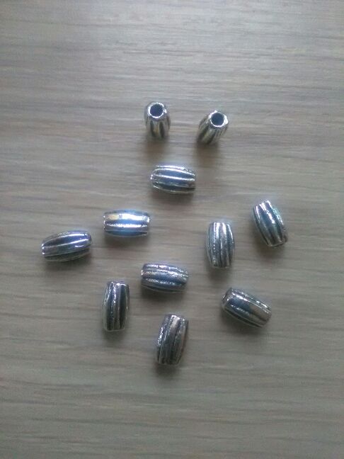 Tubo espaciador. Conector. Abalorio