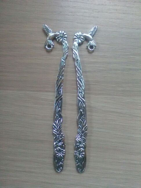 Marcapaginas pajarito flor, 1,50 € plateado.