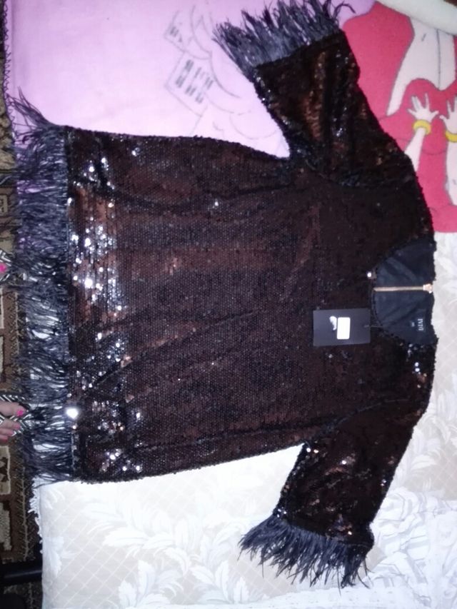 Blusa con paillettes