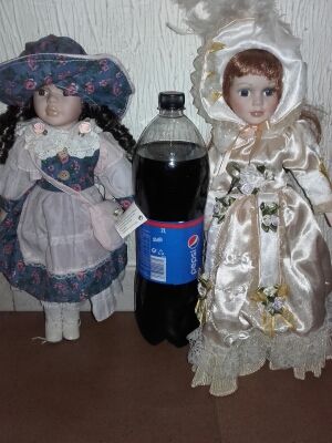 2 Muñecas de porcelana