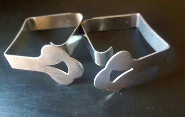 2 Sujeta manteles acero inoxidable