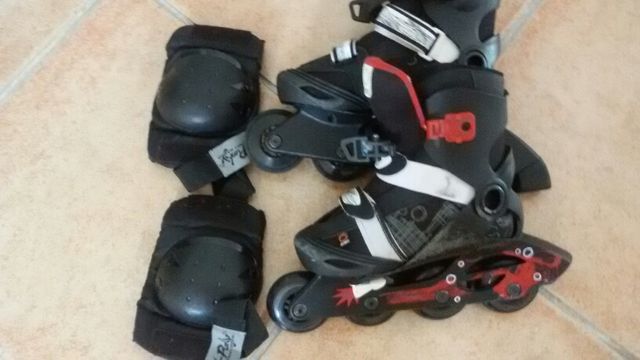 PATINES OXELO T. 32-34 con rodilleras