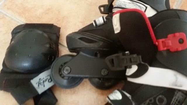 PATINES OXELO T. 32-34 con rodilleras