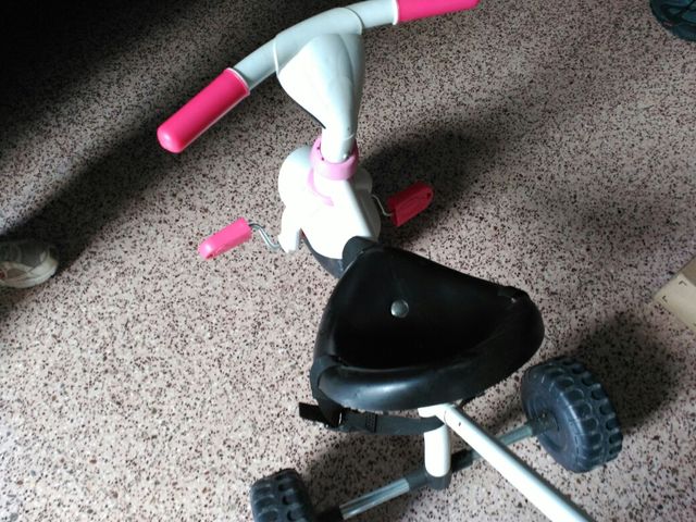 Triciclo niña con palo