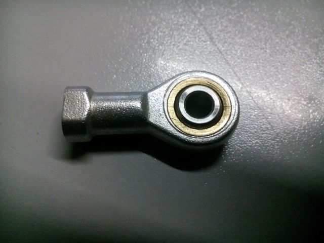 Vastago articulado con rodamiento