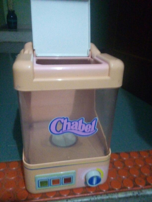 Lavadora vintaje de juguete a pilas