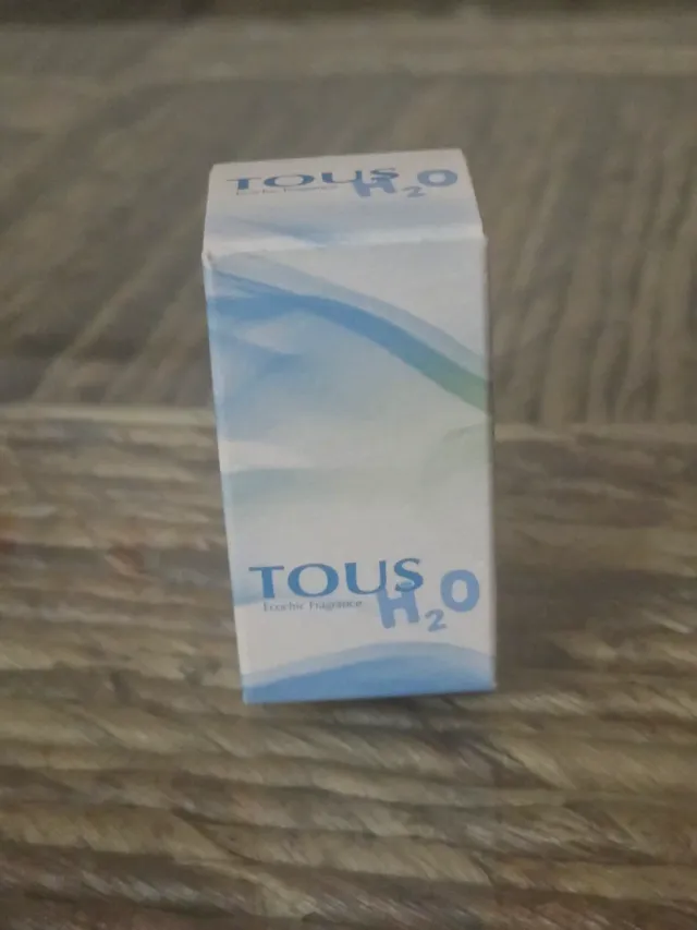 Anillo Tous Duna y muestra colonia H2O