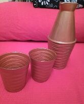 conjunto de jarra y dos vasos
