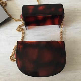 Bolso fiesta carey de Uterqüe de segunda mano por 30 EUR en Madrid en  WALLAPOP