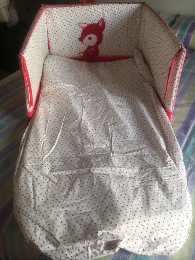 Colcha y chichonera cuna