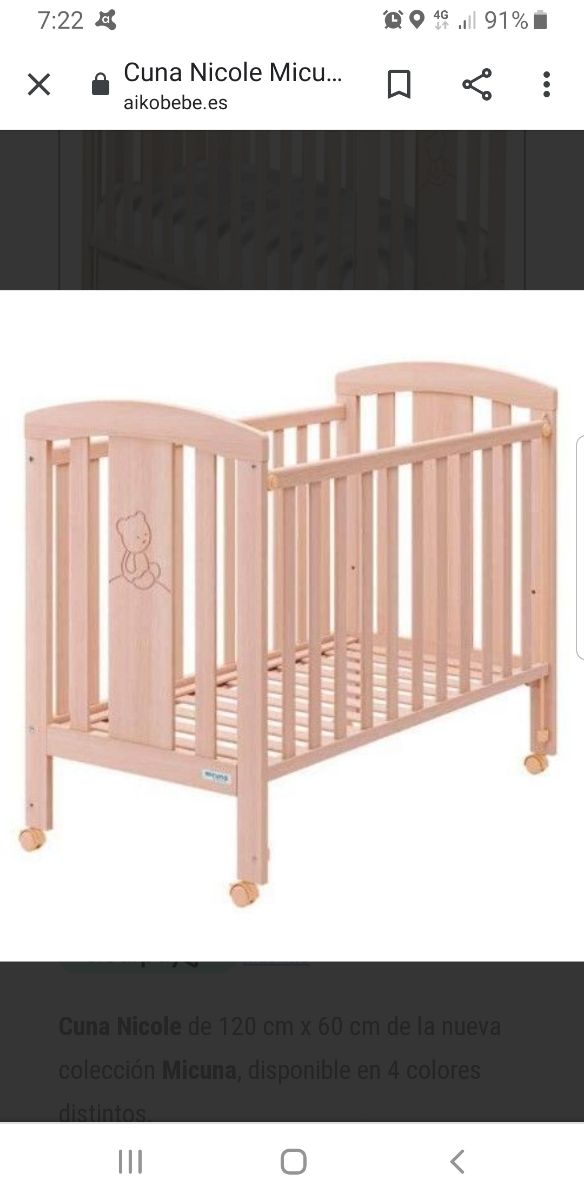 cuna de madera con colchón y protector