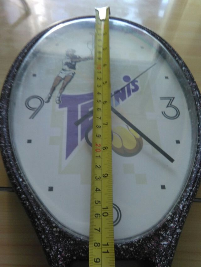 reloj forma de raqueta