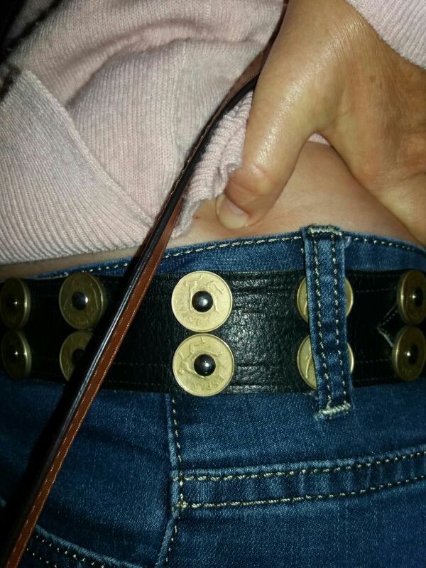 coleccionista cinturon con monedas de 25 pesetas