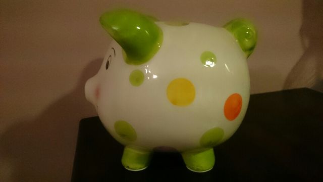 Hucha de ceramica en forma de Cerdito