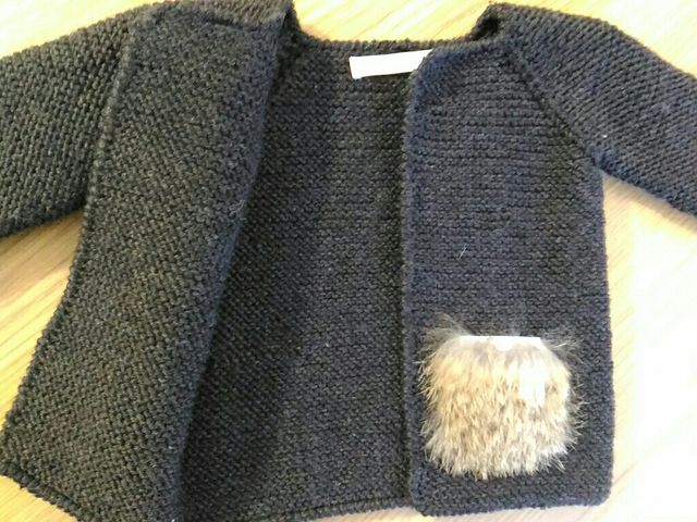 Cardigan de Casilda y Jimena con un par de puestas