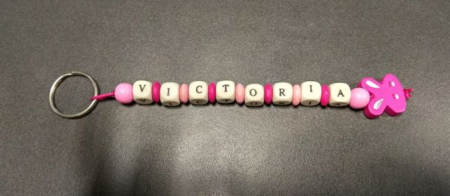 Cuelga mochila o llavero