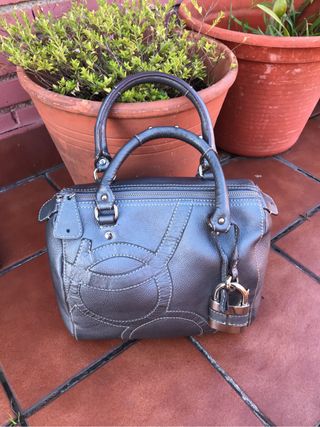 Bolso bowling Purificación García de segunda mano por 110 EUR en La Arena  en WALLAPOP