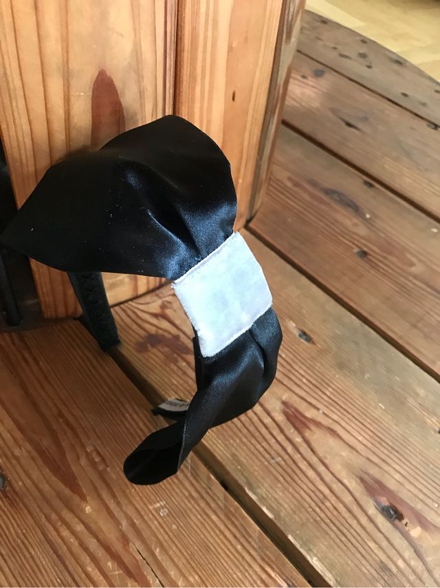 Fita de cabeça preta