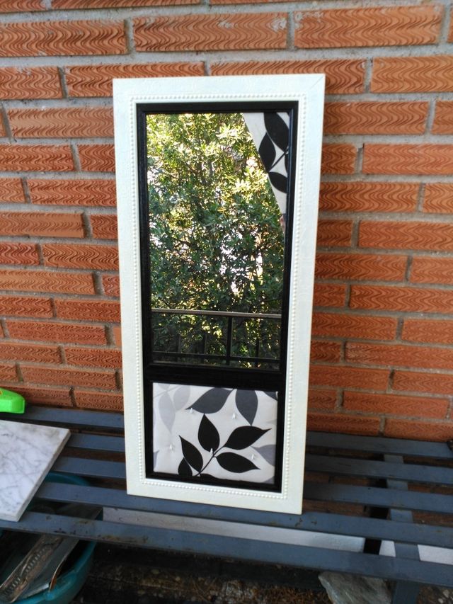 Espejo para colgar joyas