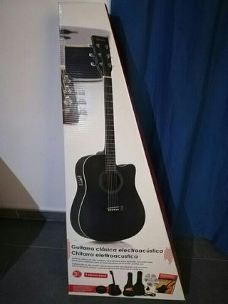 Guitarra electroacústica Axman 67280 de segunda mano por 70 EUR en Málaga  en WALLAPOP