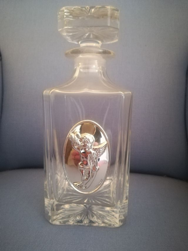 Botella de cristal y plata