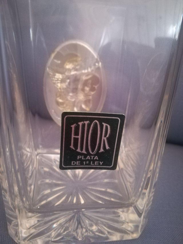 Botella de cristal y plata