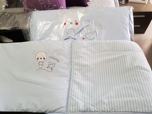 conjunto colcha y protector de cuna