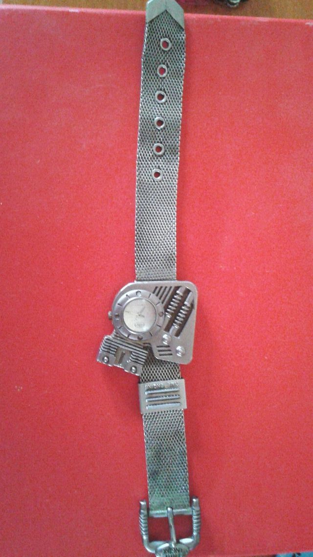 Reloj motor time engine