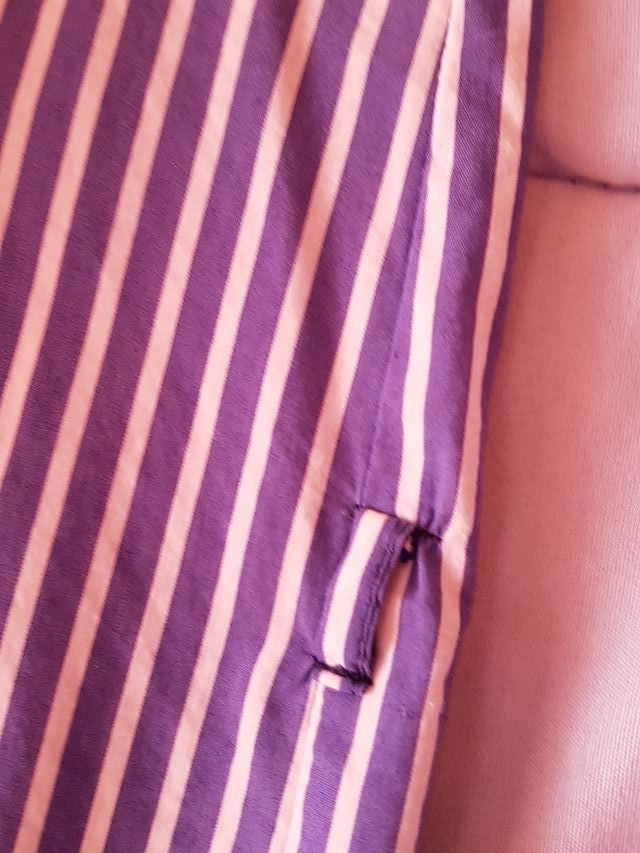 Camisa aversize listas azules y blancas.