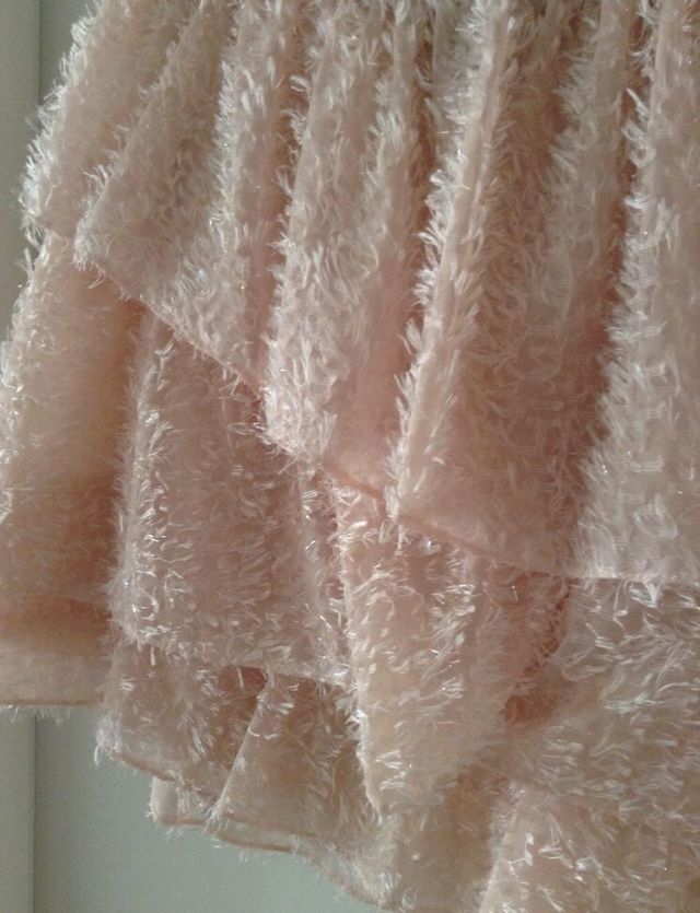 Falda de plumas H&M. Talla XL