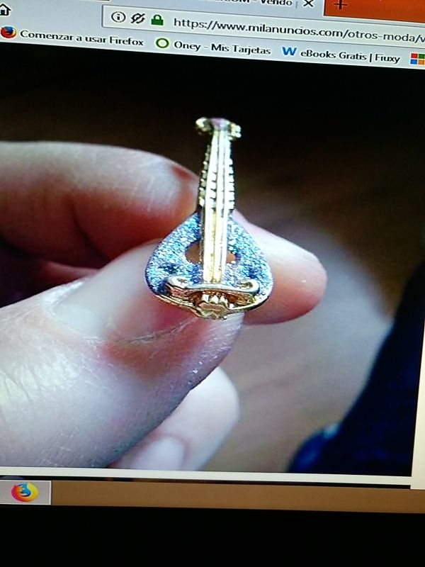 Pin de guitarra, mandolina.