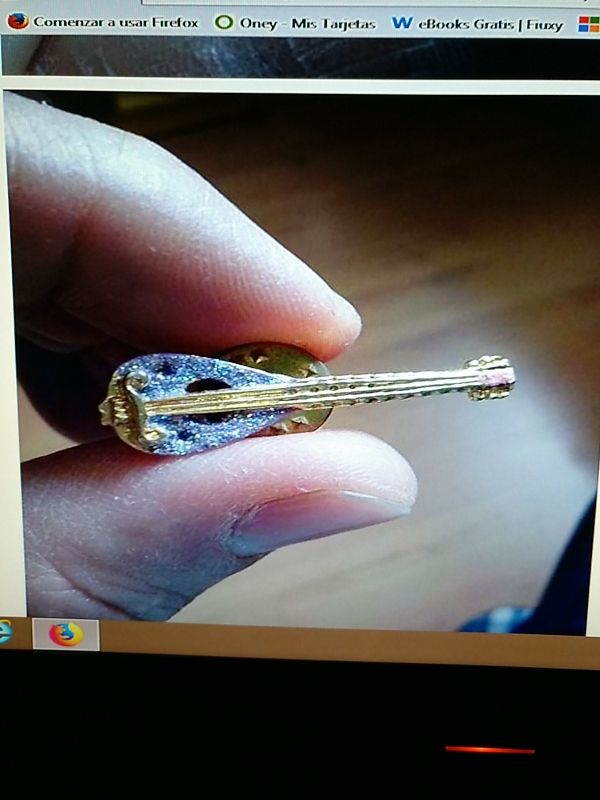 Pin de guitarra, mandolina.