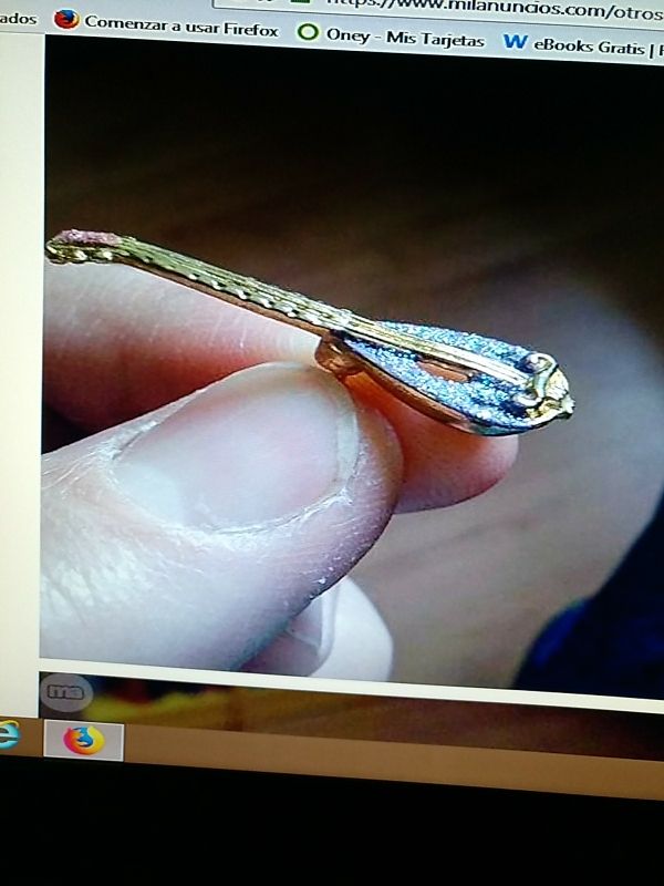 Pin de guitarra, mandolina.