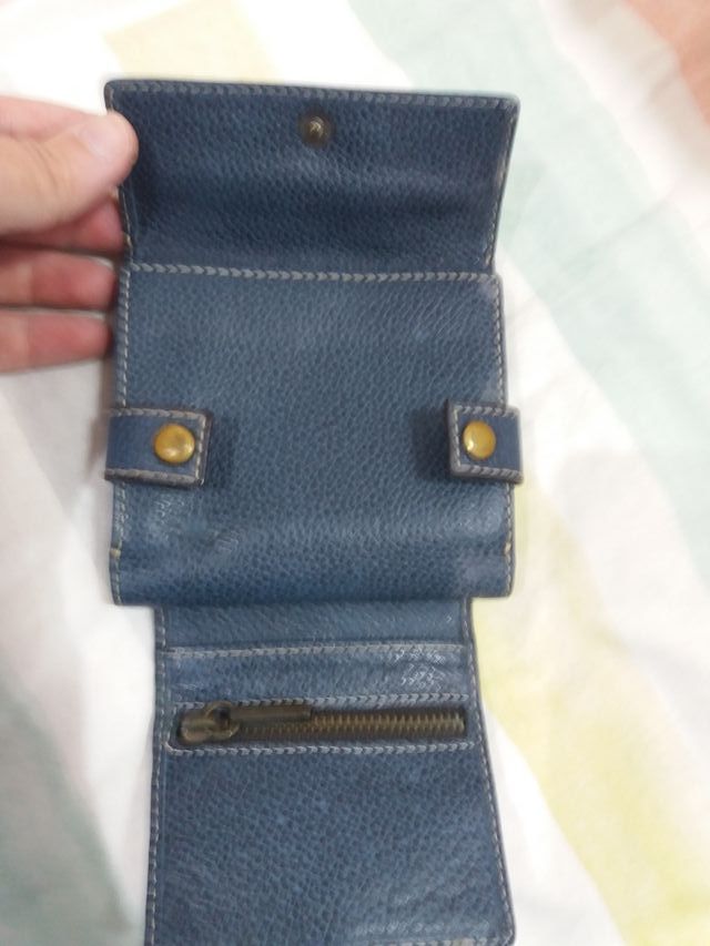 Cartera de piel de Purificación Garcia.