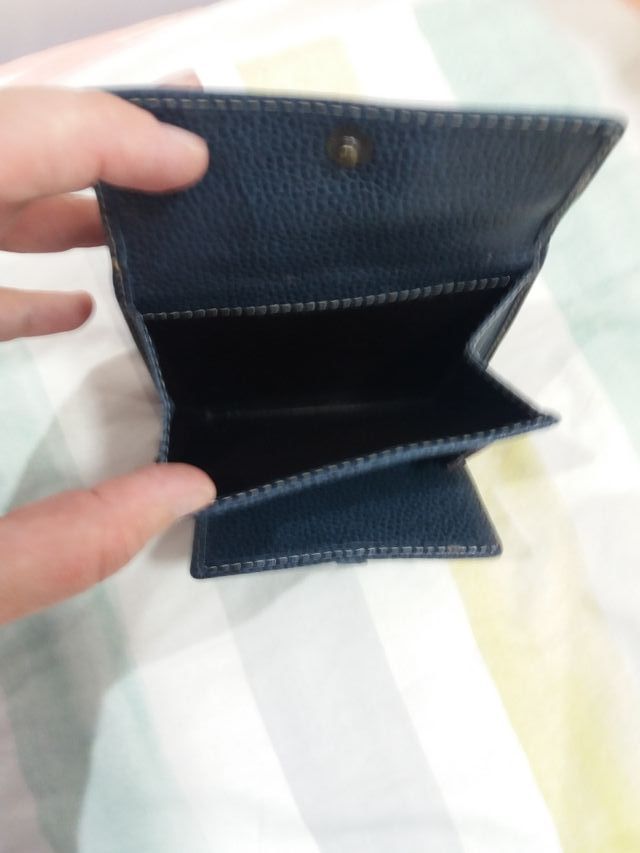 Cartera de piel de Purificación Garcia.