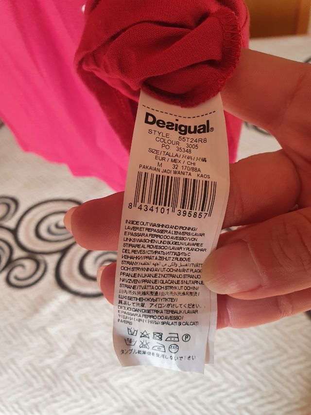 Camiseta desigual mujer T. M granate